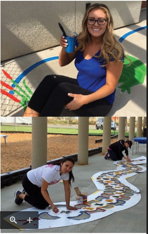people paining a playground