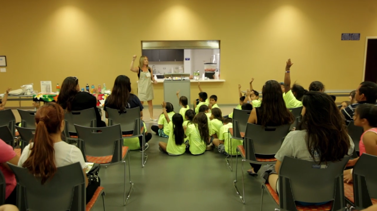 children watching a nutrition educator