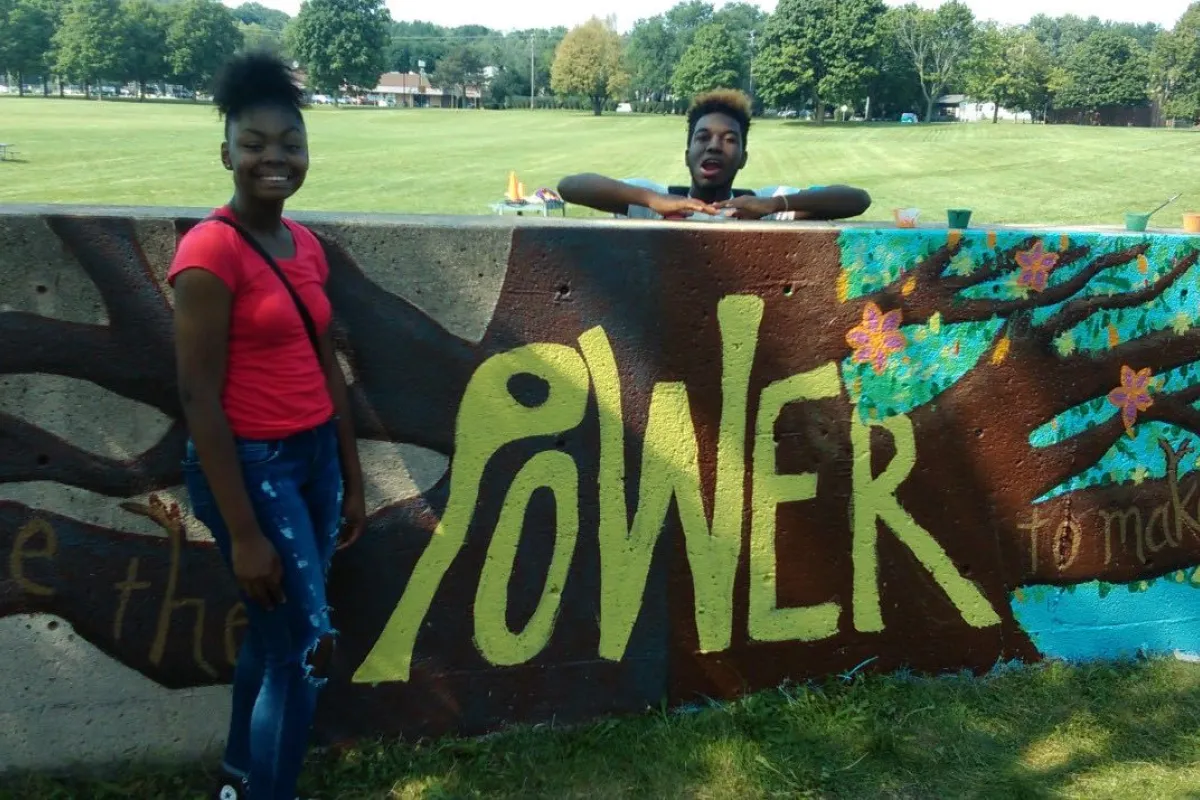 kids with a sign that says "power"