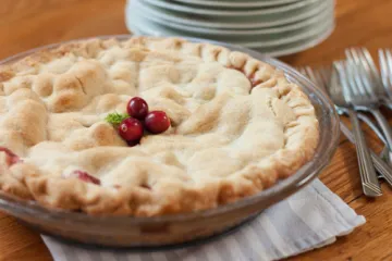 pie with cranberries on top