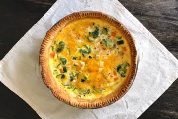 overhead view of whole quiche on a table