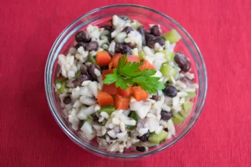 beans and rice with bell pepper on top