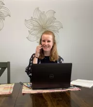 a health coach is on the phone with a client